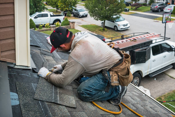 Professional Roof Replacement technician working in Avon, MT